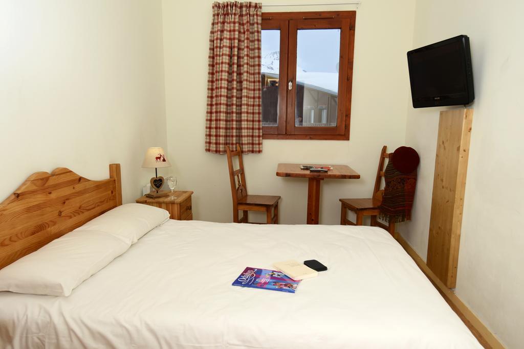 Hôtel Odalys Chalet Alpina Tignes Kamer foto